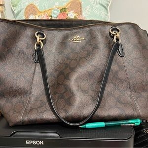 Authentic coach brown signature tote. Well loved. Some wear on bottom corners.
